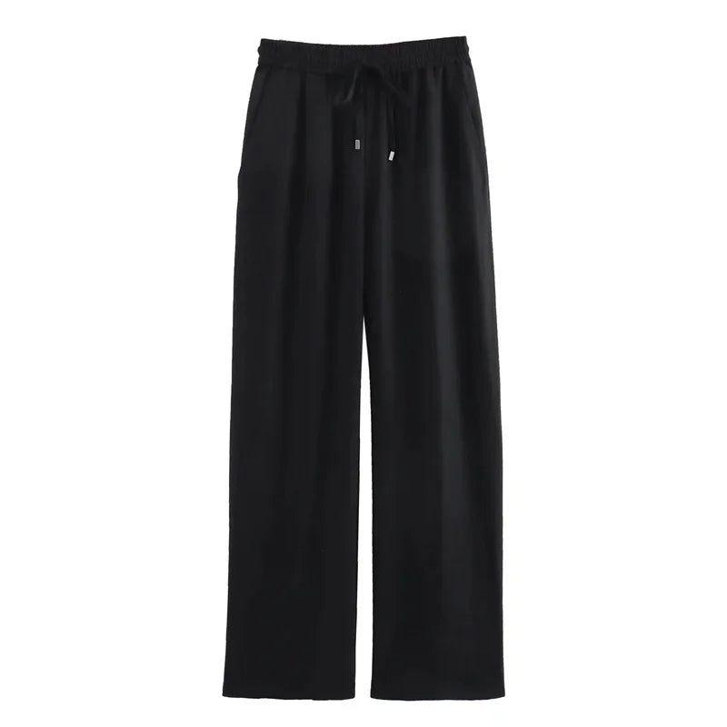 Black wide-leg lounge pants with drawstring waist and pockets on white background