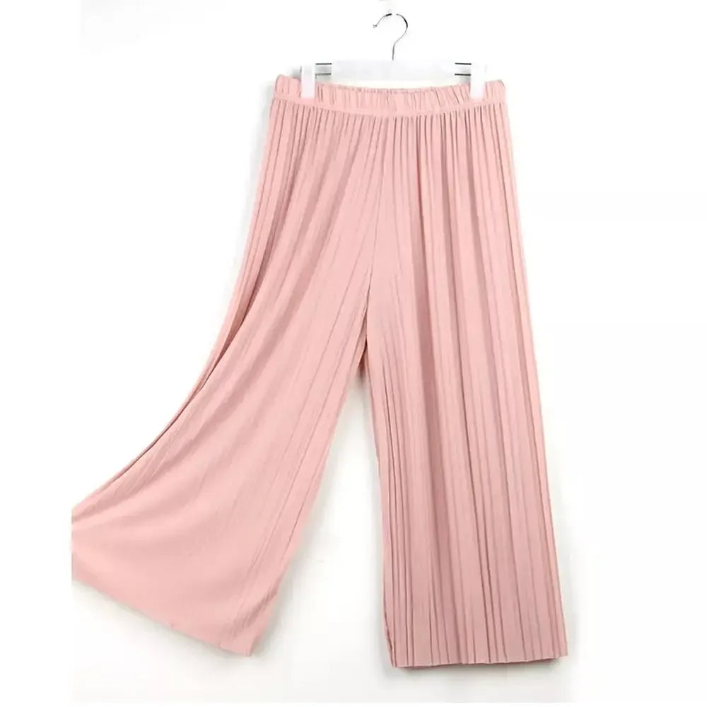 Wide-leg pink pleated pants with elastic waistband on hanger, fashion apparel